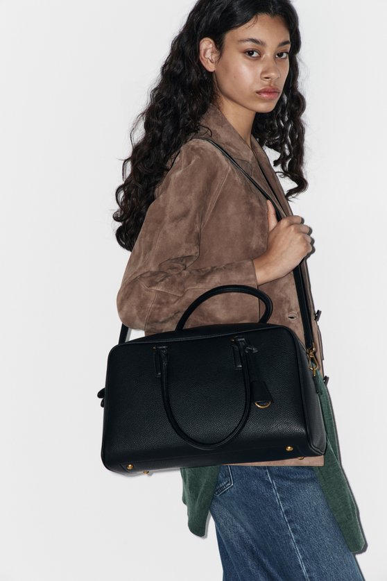 Bag with a keychain charm — image 2