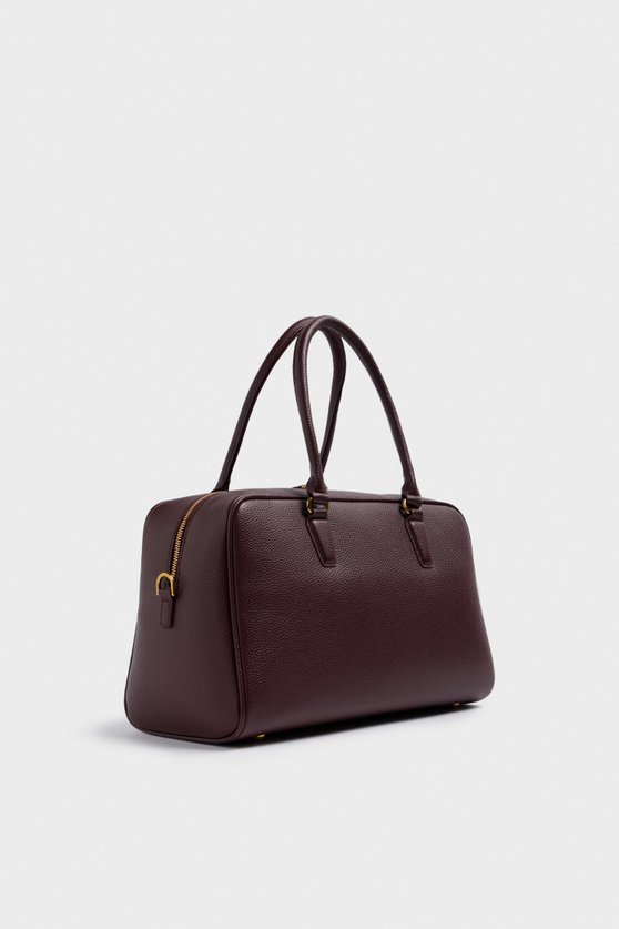 Bag with a keychain charm — image 4